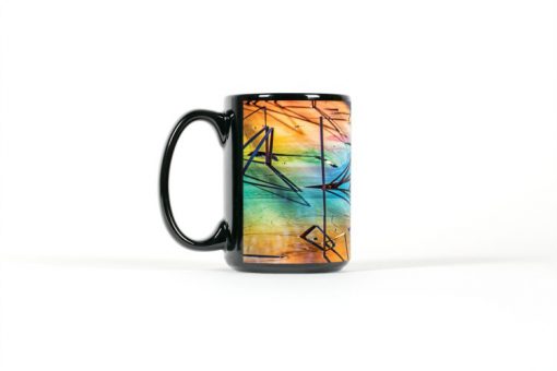 Left side view of black mug with colorful reflections in a pond